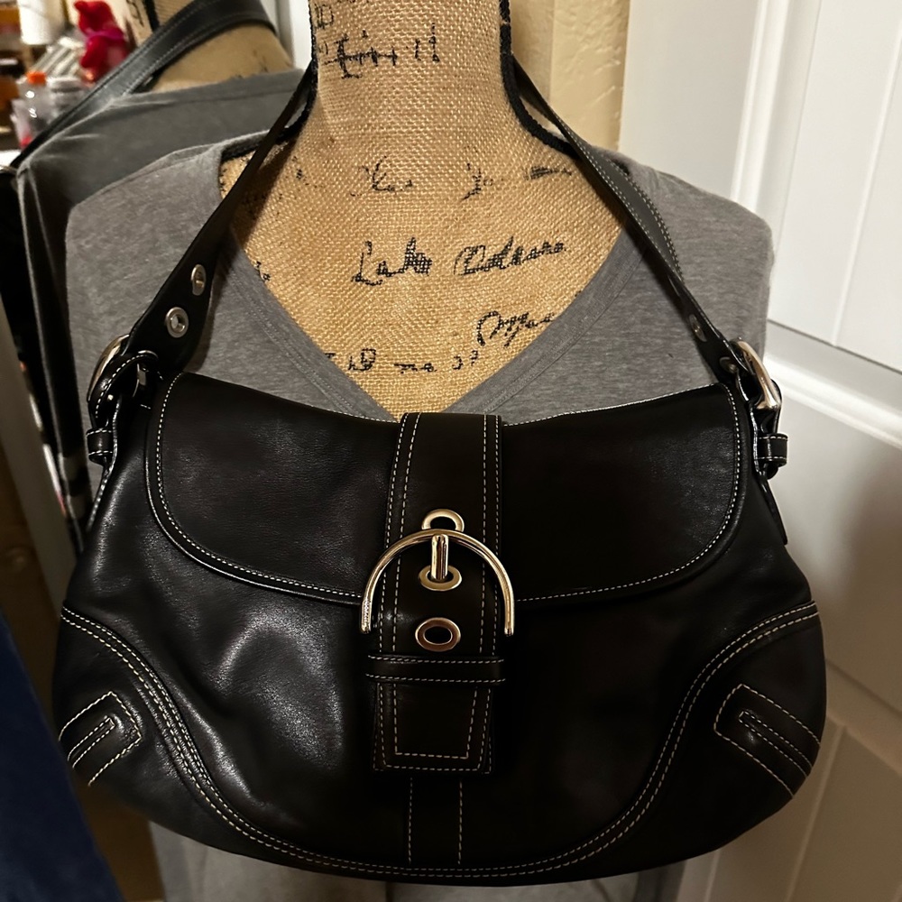Black leather coach